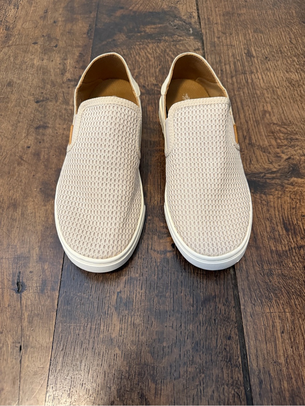 OluKai Pehuea Women’s Slip-On Moccasins in Light Beige and Tan Insole